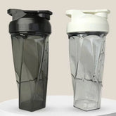 Two 600ml vortex shaker bottles with geometric bodies, one in black and one in clear.