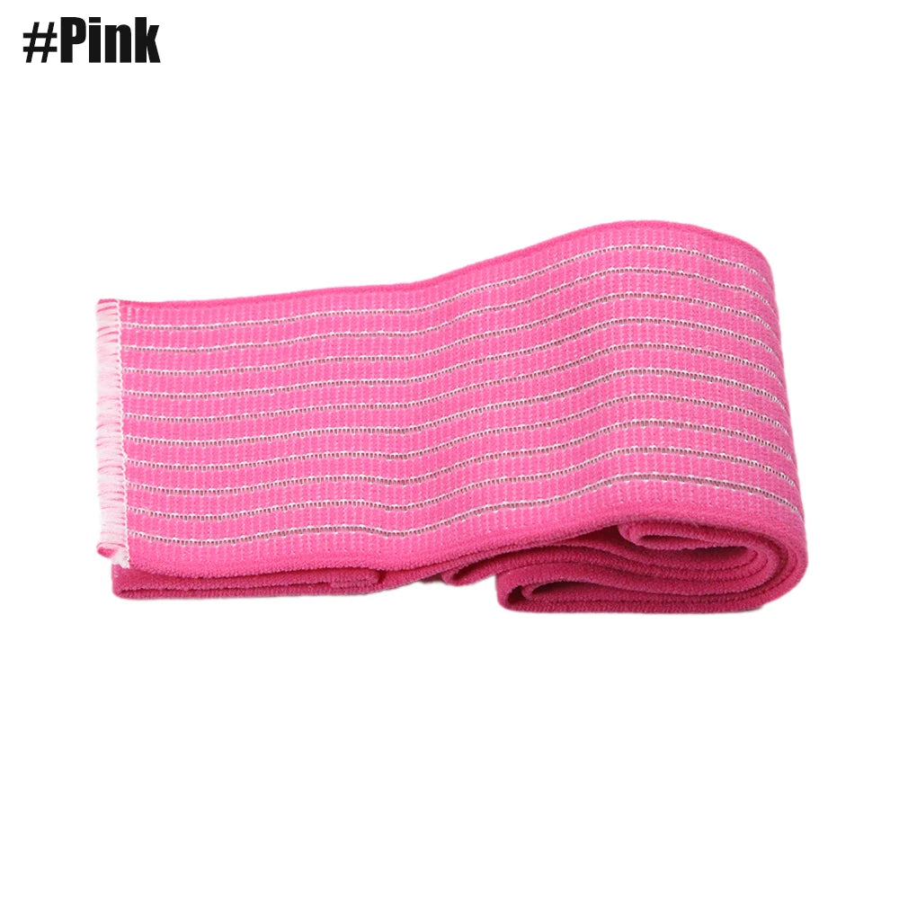 A folded pink elastic compression bandage with thin white stripes.