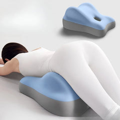 A blue and grey memory foam wedge pillow designed for stomach sleeping support.