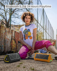 A woman poses with a black and an orange MLOVE P3 triangular outdoor Bluetooth speaker.