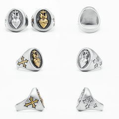 A stainless steel men's ring featuring a Sacred Heart emblem and cross side details.
