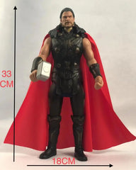 A 33cm Thor action figure with a red cape and hammer stands against a white background.