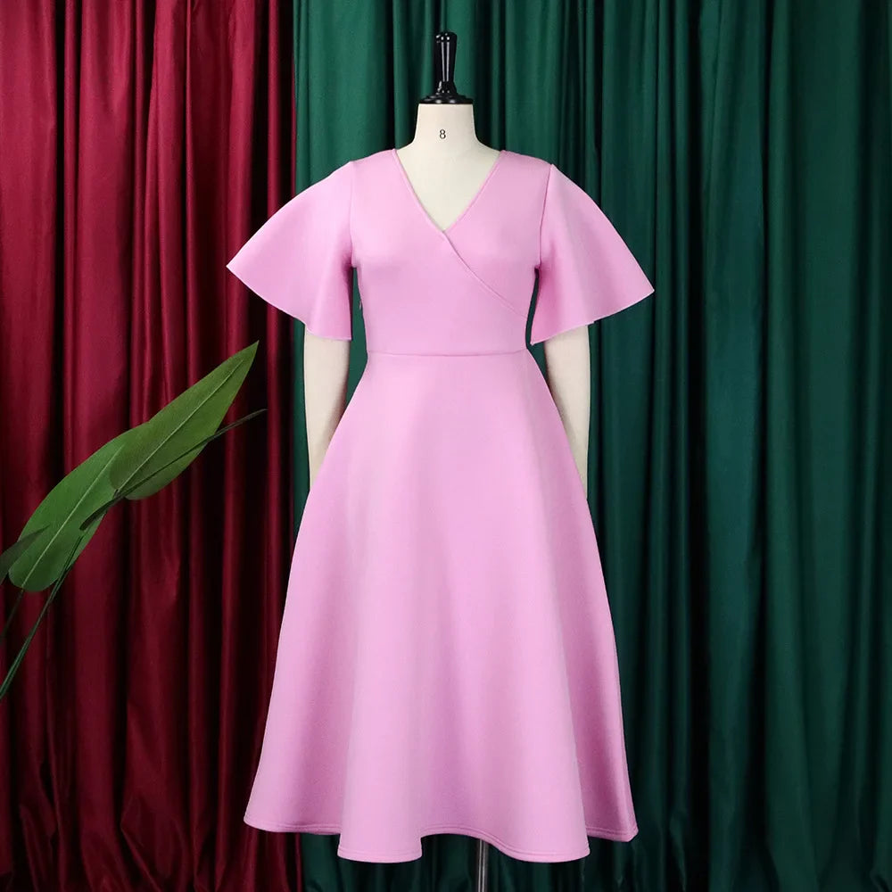 A solid pink V-neck midi dress with butterfly sleeves and an A-line silhouette.