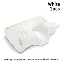 A white ergonomic memory foam pillow with a contoured shape and a quilted fabric cover.