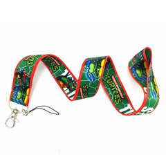 A green Teenage Mutant Ninja Turtles lanyard with a metal lobster clasp and black cord loop.