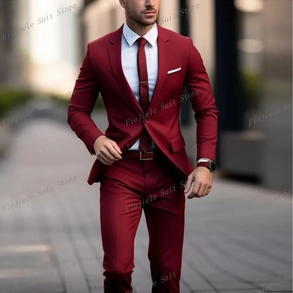 Men's maroon two-piece formal suit with a white shirt and tie.