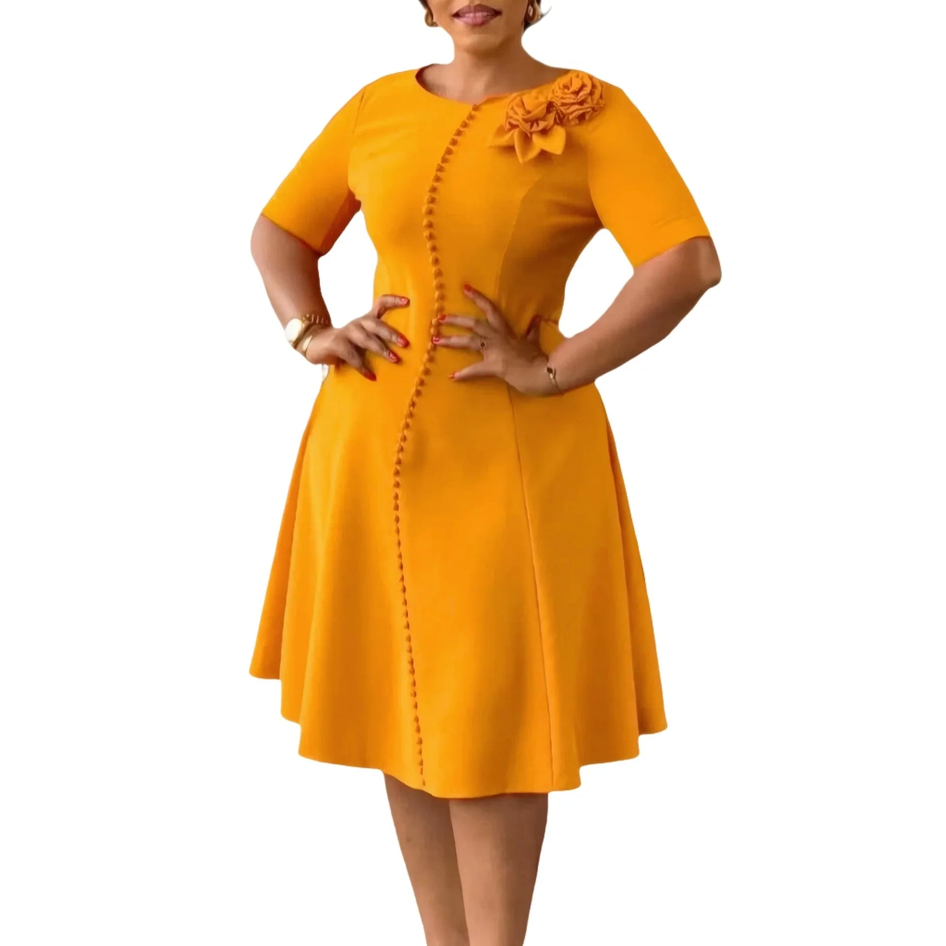 A mustard yellow A-line knee-length dress with short sleeves, a round neckline, and button detail.
