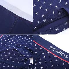 Navy blue cotton boxer shorts for men featuring a white airplane pattern and a branded waistband.