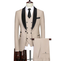 A beige three-piece suit featuring a black shawl lapel jacket, double-breasted vest, and trousers.