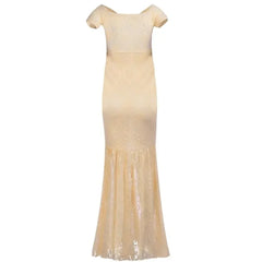 A pale yellow off-the-shoulder maternity mermaid dress with short sleeves and lace detailing.