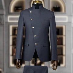 A dark grey slim-fit men's suit with a stand collar and an asymmetrical button closure.