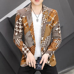 A man wears a slim-fit, single-breasted blazer featuring a patchwork of brown and tan patterns.