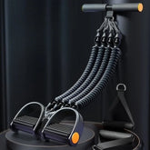 A multi-functional pedal resistance band with four elastic ropes and foam handles.