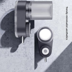 A minimalist grey faucet water purifier with a clear filter housing shown from two angles.