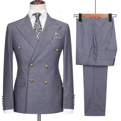 A grey double-breasted suit jacket with gold buttons and matching trousers.