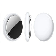 Three views of a white, circular smart tracker with a polished silver metal back.