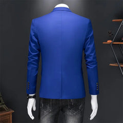 A back view of a solid blue men's single-breasted blazer with a center back vent.