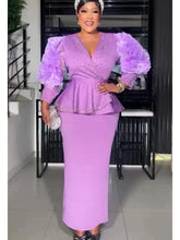 Elegant African women’s long Ankara dress with vibrant dashiki print, perfect for weddings and parties, by Showlu Fashion.