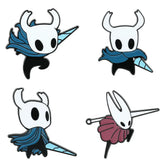 Four enamel pins featuring characters from Hollow Knight, including the Knight and Hornet.