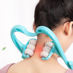 A person uses a blue manual neck massager with six white rolling wheels on their neck.