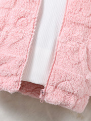 A close-up of a pink fuzzy hooded coat with a white ribbed zipper placket.