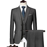 A charcoal grey three-piece suit set featuring a single-breasted jacket, vest, and trousers.