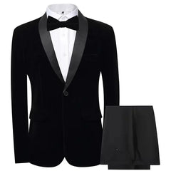 A black velvet slim fit tuxedo suit featuring a shawl lapel blazer and matching trousers.