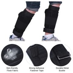 A pair of black adjustable ankle weights featuring breathable fabric, adhesive straps, and buckles.