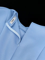 A close-up view of the back zipper and collar of a light blue AOMEI dress in size 1XL.