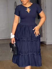 A navy blue A-line midi dress with short sleeves, a cutout neckline, and ruffled tiered layers.