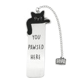 A stainless steel bookmark featuring a black cat design and the text You Pawsed Here.