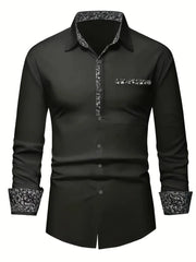 A black long-sleeved button-down shirt featuring a floral print on the collar, cuffs, and placket.