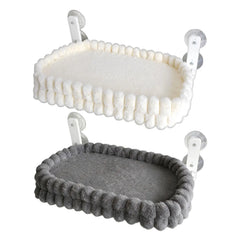 Two plush cat window perches with suction cups, one in white and one in grey.
