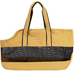 A mustard yellow canvas pet carrier bag with a black mesh panel and two shoulder straps.