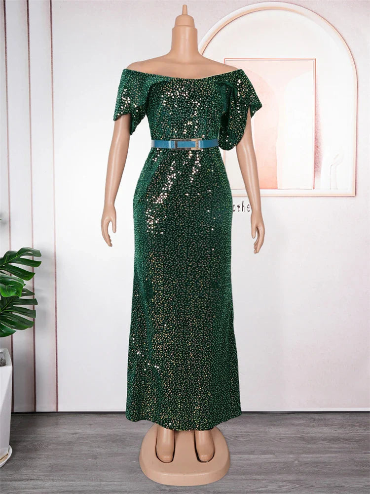 A floor-length green sequin mermaid dress with petal sleeves and a blue waist belt.