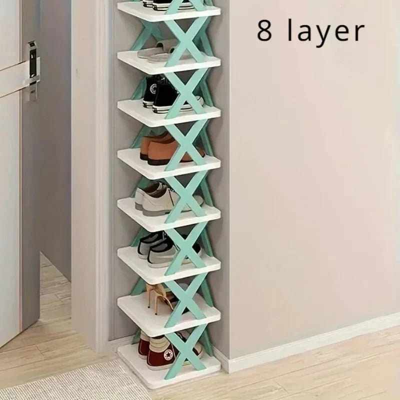 An eight-layer vertical shoe rack with white shelves and teal X-shaped supports.