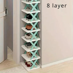 An eight-layer vertical shoe rack with white shelves and teal X-shaped supports.