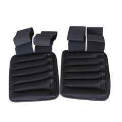 A pair of black adjustable ankle or wrist weights with mesh fabric and secure velcro straps.