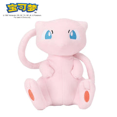 A soft pink Mew plush toy with large blue eyes and a long tail sitting on a white background.