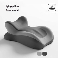 A grey ergonomic memory foam pillow with a concave shape for neck or leg support.