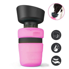 A pink foldable dog water bottle with a black drinking bowl attachment.