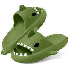 A pair of olive green shark-themed EVA slides with white teeth and fin details.