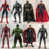 A collection of eight 18-centimeter superhero action figures including Spider-Man, Venom, Batman, Superman, Iron Man, Hulk, Doctor Strange, and Black Panther.