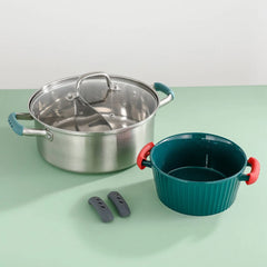 A stainless steel divided pot, a green ceramic bowl with red handles, and two grey silicone grips.