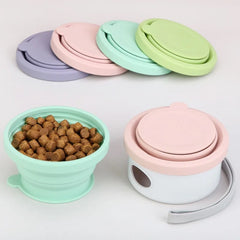 A set of collapsible silicone pet travel bowls in various pastel colors with a carrying strap.
