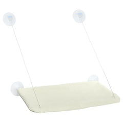 A beige cat hammock with four suction cups and support wires for mounting on a window.