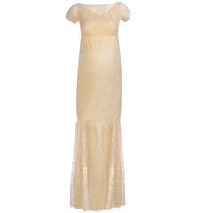 A pale yellow lace maternity mermaid gown with a V-neck and short sleeves.
