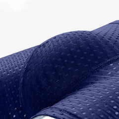 A close-up view of dark blue men's boxer shorts made from a breathable, knit mesh fabric.
