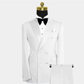 A white double-breasted two-piece suit featuring a peak lapel blazer and matching trousers.