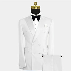 A white double-breasted two-piece suit featuring a peak lapel blazer and matching trousers.